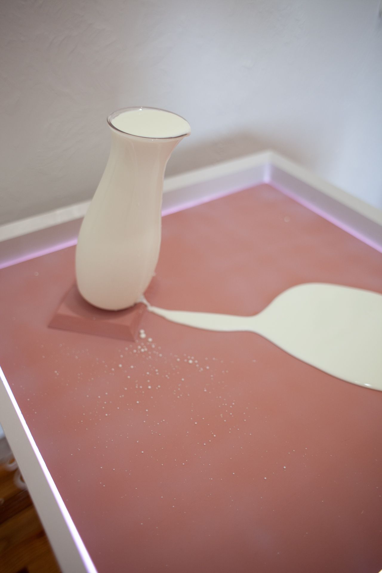 Detail of milk flowing.